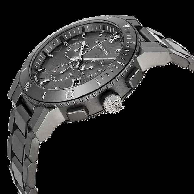 Attache bracelet Burberry BU9381 bracelet acier brossé maillons trois rangées fermoir déployant double sécurité gravé signature Burberry