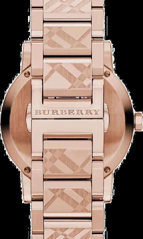 Visage cadran Burberry BU9146 avec aiguilles dauphine rhodiées et date à 3h sur fond argenté