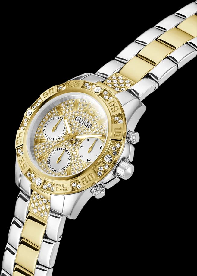 Visage cadran Guess GW0771L3 avec index cristaux scintillants, aiguilles dauphine bicolores et date à 3h, précision quartz