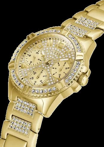 Visage cadran Guess W1156L2 présente index à strass, aiguilles dorées et date à 3h nacré lumineux