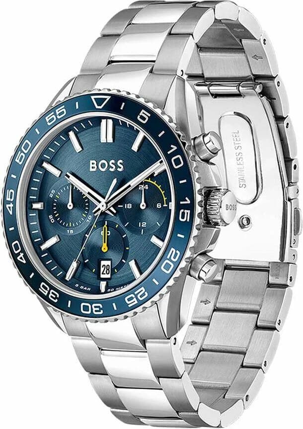 Visage cadran Hugo Boss 1514143 dévoile des aiguilles facettées, index bâtons argentés et guichet date à 4h30 pour une lisibilité précise