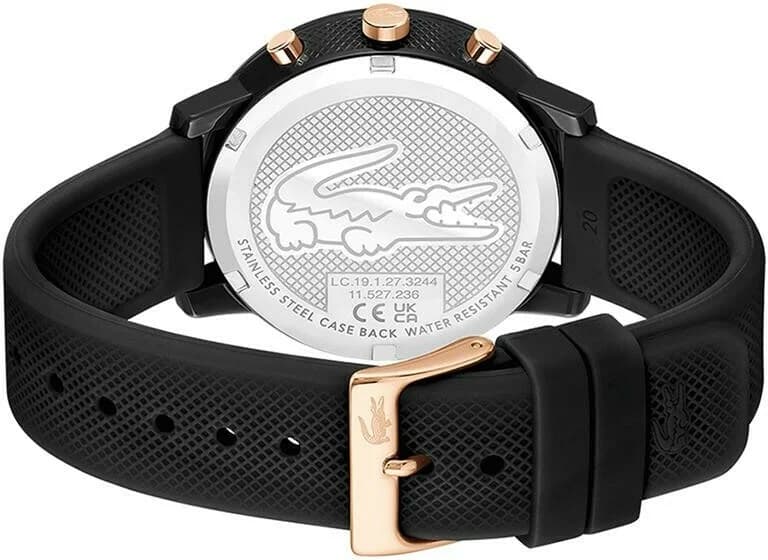 Attache bracelet Lacoste 2011247 en silicone noir texturé, boucle ardillon signée, confort et durabilité