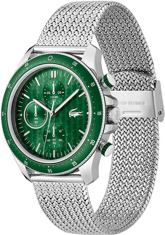 Visage cadran Lacoste 2011255 détail du motif soleil vert, aiguilles argentées et date à 3h, lisibilité optimale
