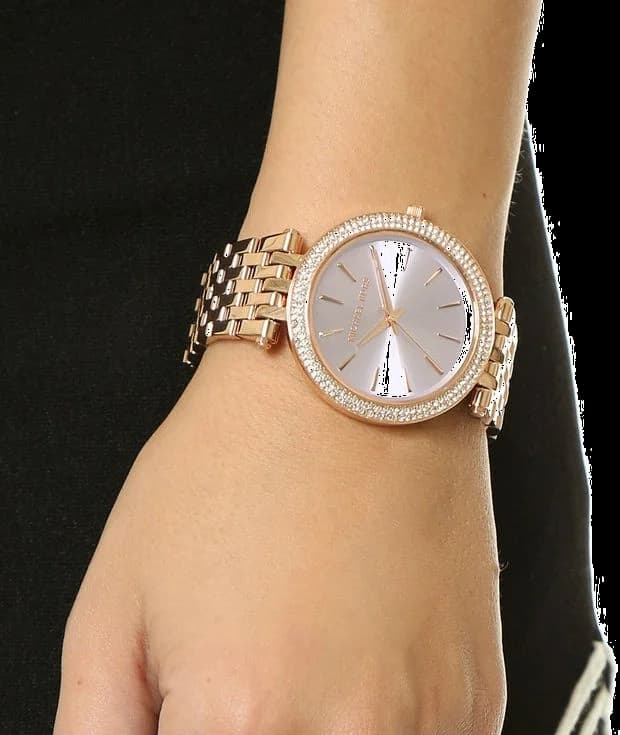 Visage cadran Michael Kors MK3507 doté d'index bâtons dorés et date à 3h, mouvement quartz précis