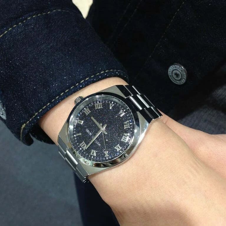Attache bracelet Michael Kors MK6113 en acier inoxydable bicolore maillons milanais fermoir déployante double sécurité