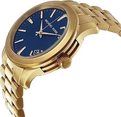 Visage cadran Michael Kors MK7049 présentant index appliqués dorés, aiguilles dauphine et guichet date à 3h