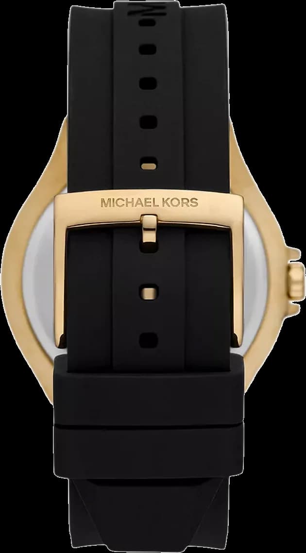 Visage cadran Michael Kors MK7247 dévoile index bâtons dorés et aiguilles à facettes sur mouvement à quartz visible