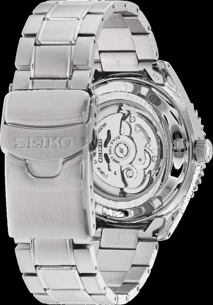 Visage cadran Seiko SRPB93K1 révélant index bâtons polis, aiguilles dauphine noires et guichet date à 3h sur fond vert rayonnant
