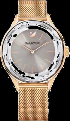 Garde-temps Swarovski 5451634 présentant cadran blanc nacré et index cristaux scintillants sur fond acier rose