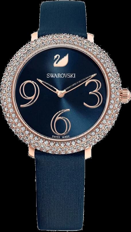 Garde-temps Swarovski 5484061 arborant un cadran bleu nuit satiné, aiguilles dorées et index cristal, style élégant
