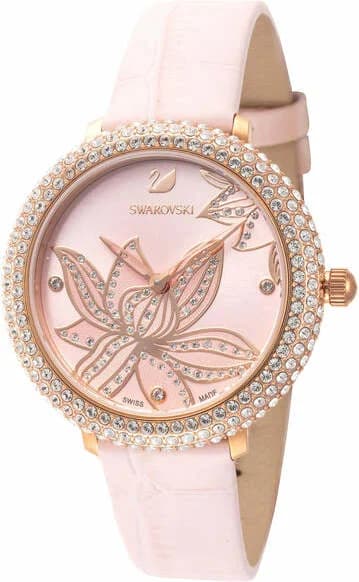 Garde-temps Swarovski 5575217 avec cadran floral blanc et aiguilles dorées sur fond nacré