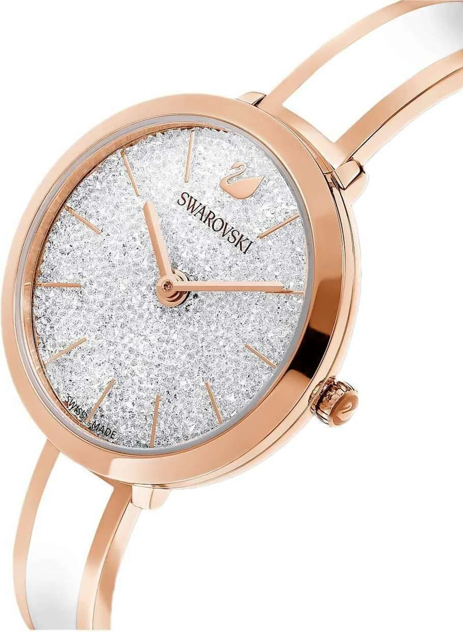 Visage cadran Swarovski 5580541 avec index cristal et aiguilles dorées, complications date et quartz précis