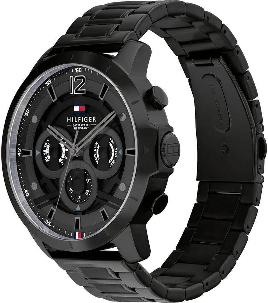 Visage cadran Tommy Hilfiger 1710494 affichant compteurs date, jour et 24h, aiguilles bâtons et index argentés sur noir mat