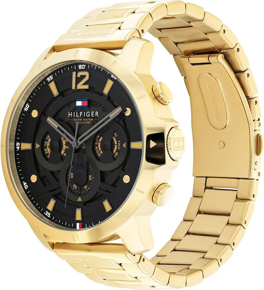 Visage cadran Tommy Hilfiger 1710511 dévoile trois sous-cadres pour date, jour et 24h sur fond champagne texturé avec aiguilles luminescentes