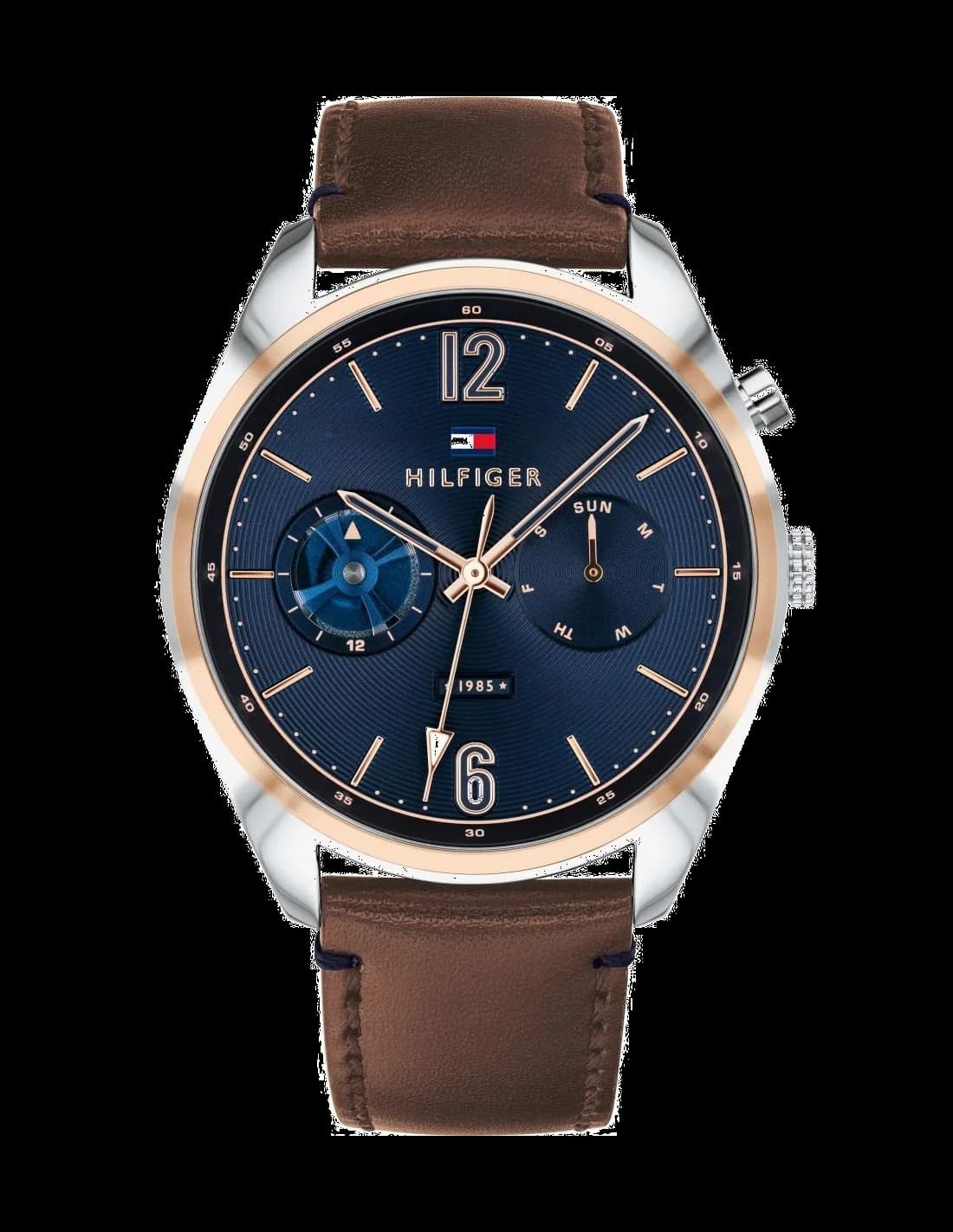 Garde-temps Tommy Hilfiger 1791549 avec cadran bleu soleil, index bâtons et aiguilles argentées sur fond bleu profond