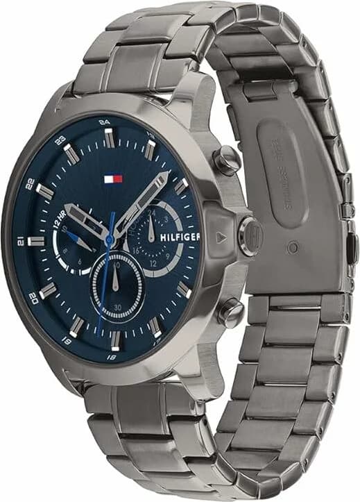 Visage cadran Tommy Hilfiger 1791796 avec index bâtons polis, aiguilles luminescentes et guichet date à 3h sur motif linéaire gris