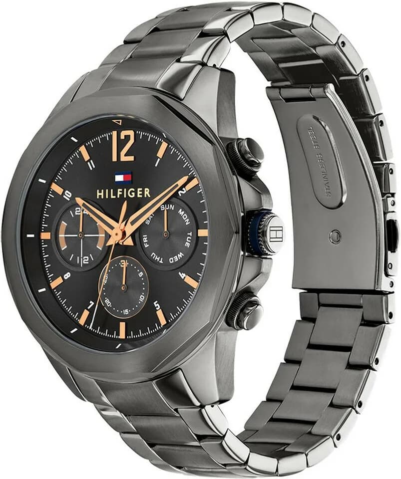 Visage cadran Tommy Hilfiger 1792061 doté d'aiguilles bâtons phosphorescentes et guichet date à 3h sur fond gris soleillé