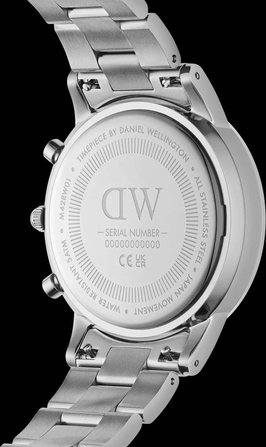 Attache bracelet Daniel Wellington DW00100644 en acier inoxydable maillons milanais, fermoir déployant double sécurité gravé logo