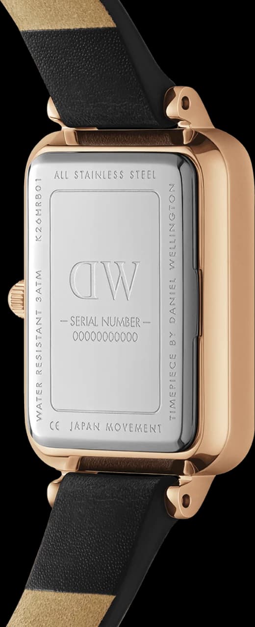 Attache bracelet Daniel Wellington DW00100449 en cuir noir lisse avec coutures contrastées et boucle ardillon en acier inoxydable PVD or rose