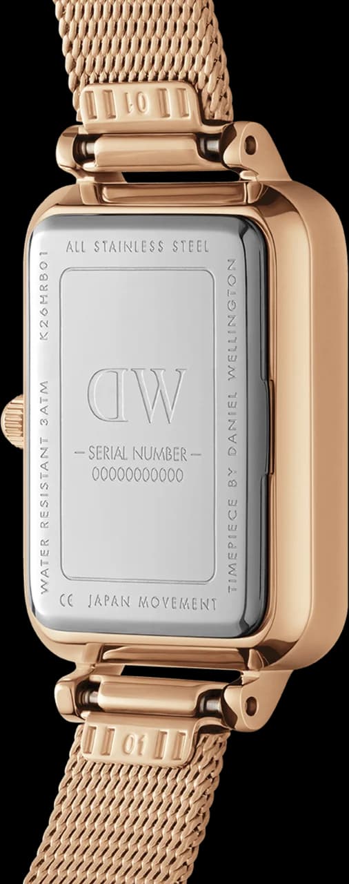 Attache bracelet Daniel Wellington DW00100465 en cuir véritable blanc veiné et boucle ardillon en acier doré à l'or rose