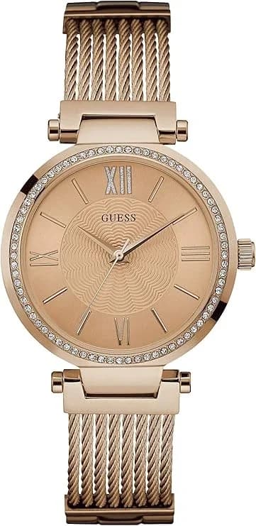 Garde-temps Guess W0638L4 au cadran soleil or rose avec index bâtons et aiguilles dorés, style minimaliste chic