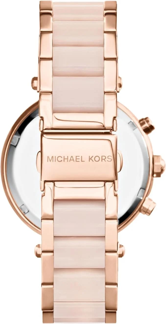 Visage cadran Michael Kors MK6326 dévoile index appliques et aiguilles en acier, date à 3h sur fond champagne